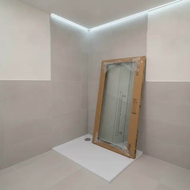 Shower tray and a boxed enclosure in the bathroom corner