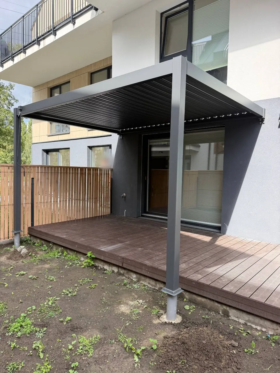 Aluminium louvred pergola by the terrace